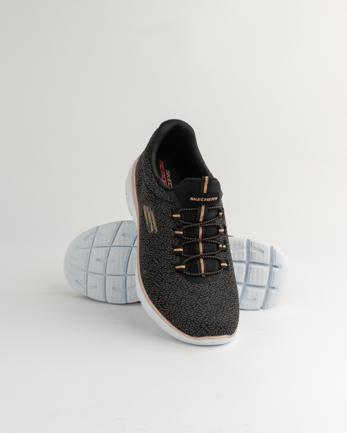 ladies black and gold skechers
