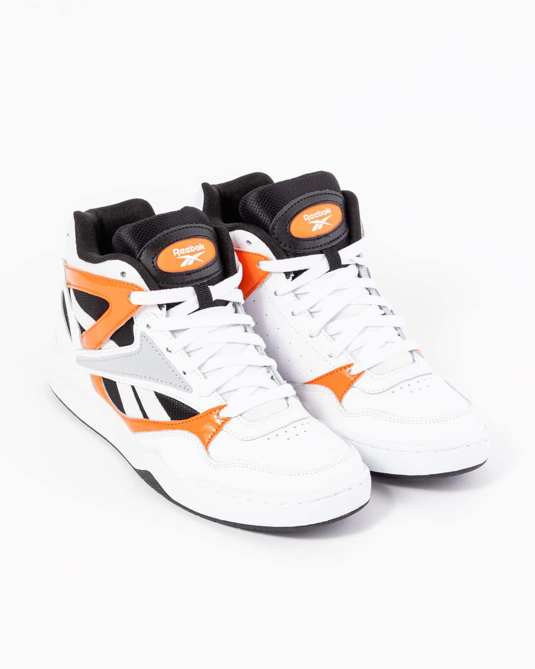 Reebok mens hi top sneakers white & orange side profile