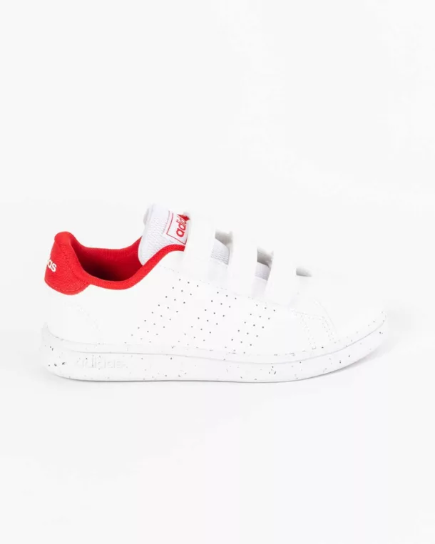 Side profile of children's white adidas sneaker with red collar and adidas logo on tongue with velcro straps