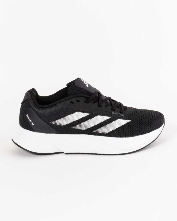 side angled shot of men's adidas trainers in black with three stripes across upper in white
