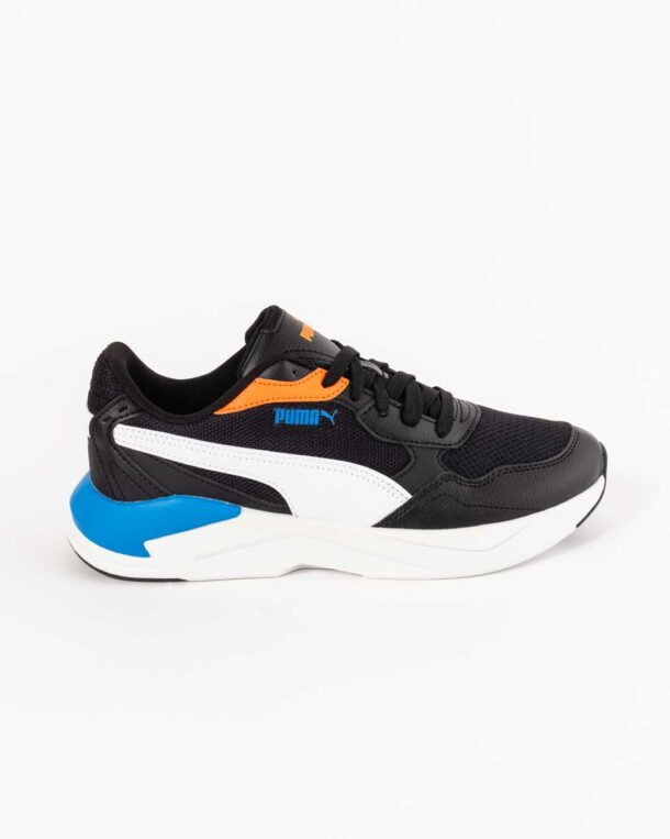 side shot of children's sneakers in black with white , blue and orange paneling, with white midsole