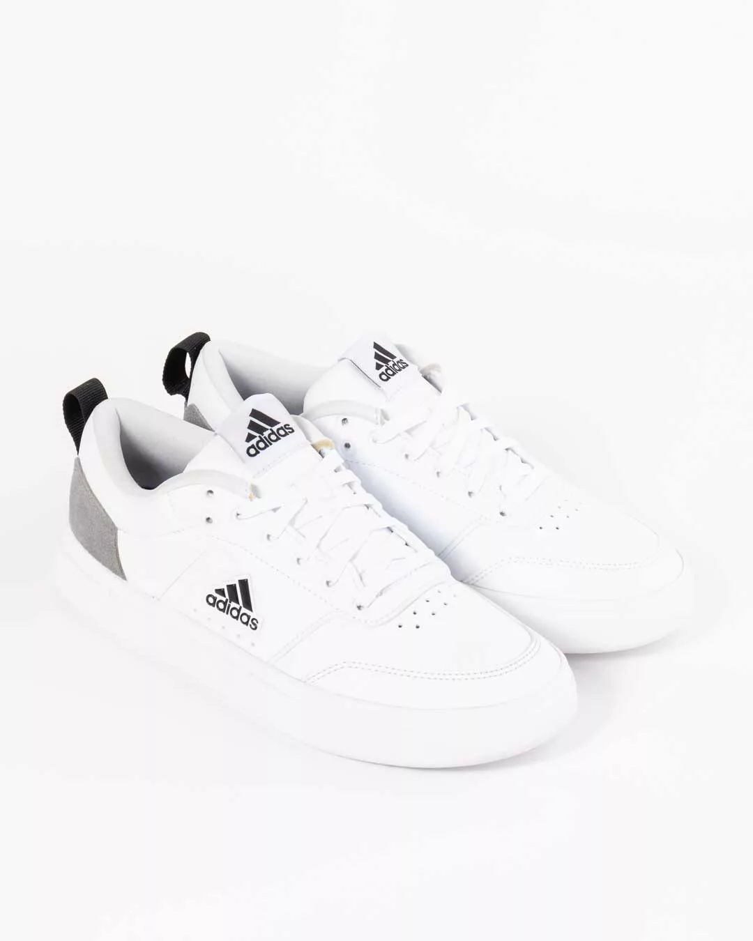 side angle shot of white adidas mens sneakers adidas logo on upper, grey vamp and pull tab on heel